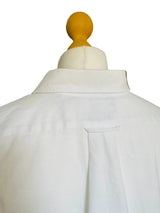 White top on a mannequin.
